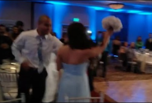 Doing Too Much: Groomsman Backflips During Reception Entrance And Knocks Out Bridesmaid! (Video)